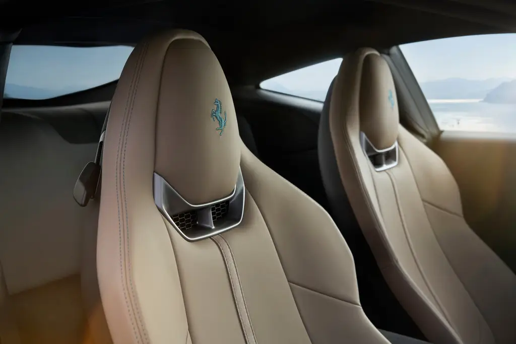 Hand-stitched leather sport seats with the Cavallino embroidered into the headrests. Photo: Ferrari.