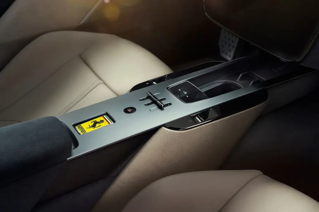 Machined aluminium runs along the central tunnel — a subtle nod to Ferrari's classic gated shifter. Photo: Ferrari.